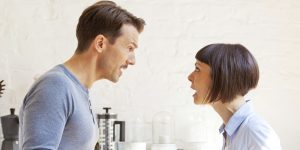 Couple having a discussion in the kitchen